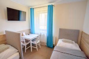 Posteľ alebo postele v izbe v ubytovaní Botanik Hostel