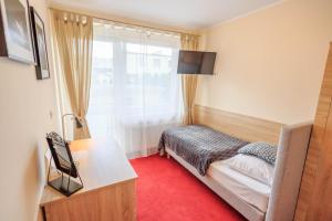 Posteľ alebo postele v izbe v ubytovaní Botanik Hostel