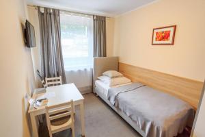 Posteľ alebo postele v izbe v ubytovaní Botanik Hostel