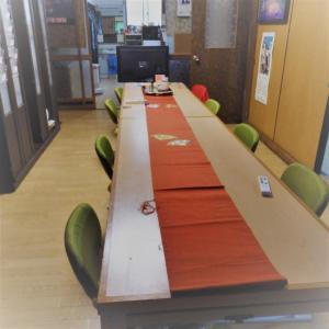 a long table with green chairs in a room at Minshuku Mariko / Vacation STAY 895 in Mochimune