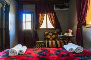 Voodi või voodid majutusasutuse Riad Atlas Panorama toas