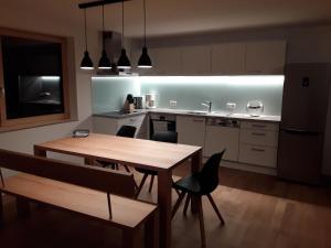 Kuchyň nebo kuchyňský kout v ubytování Appartment Hirschberg