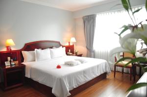 Postel nebo postele na pokoji v ubytování Kingdom Hotel + 37 fotografií