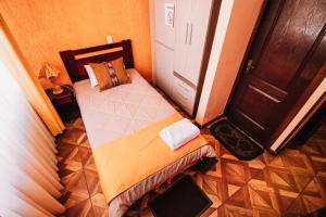 Cama o camas de una habitación en Las Tholas Hotel