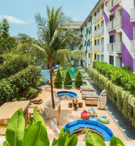 a view of the pool at the resort at Bliss Surfer Hotel by Tritama Hospitality in Legian