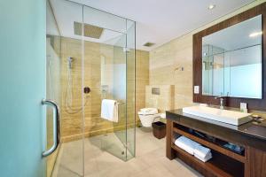 Koupelna v ubytování de Vins Sky Hotel Seminyak