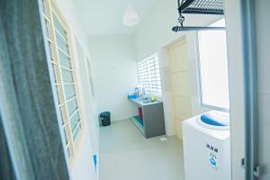 Koupelna v ubytování Ipoh Meru Animation Homestay by Grab A Stay