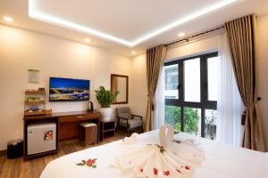 Postel nebo postele na pokoji v ubytování HODI Hotel + 37 fotografií