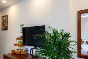 TV a/nebo společenská místnost v ubytování HODI Hotel