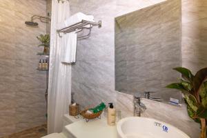 Koupelna v ubytování HODI Hotel