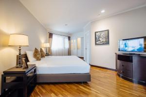 Cama o camas de una habitación en CNC Residence