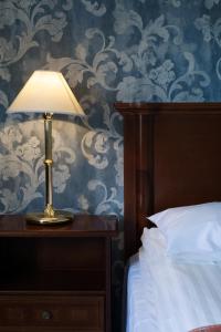 Tempat tidur dalam kamar di Seljord Hotel - Unike Hoteller