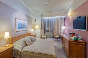 Posteľ alebo postele v izbe v ubytovaní Hotel Wentzl