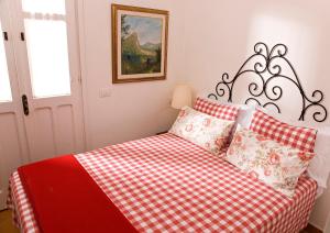 La Vignaredda - Residenza di Charme tesisinde bir odada yatak veya yataklar