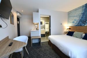 Postel nebo postele na pokoji v ubytování In Situ Hotel