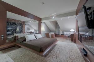 Posteľ alebo postele v izbe v ubytovaní Hotel Wentzl