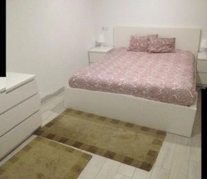 Cama o camas de una habitación en casa das pombas