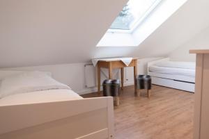 Cama o camas de una habitación en Ferienwohnung Stern