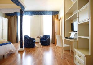 Кровать или кровати в номере Residence Liberty