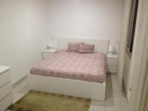 Cama o camas de una habitación en casa das pombas