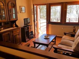 Una televisión o centro de entretenimiento en Apartament Limone