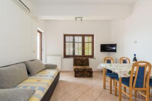 TV a/nebo společenská místnost v ubytování Apartments Villa Adria