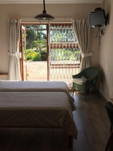 Ένα ή περισσότερα κρεβάτια σε δωμάτιο στο Blue Skies Country House