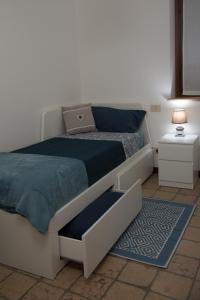 Krevet ili kreveti u jedinici u okviru objekta Casa vacanze Corte dei dami
