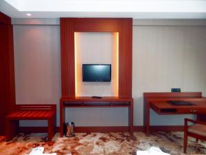 A television and/or entertainment centre at The Green Park Kartepe