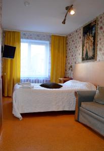سرير أو أسرّة في غرفة في Velga