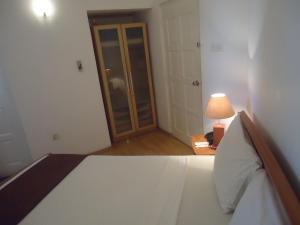 Voodi või voodid majutusasutuse Global Towers Hotel & Apartments toas