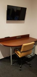 Televízia a/alebo spoločenská miestnosť v ubytovaní Pension & Restaurace Na Rychtě