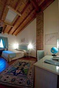 Postel nebo postele na pokoji v ubytování Resort La Mola
