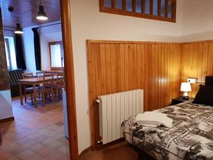 Postel nebo postele na pokoji v ubytování Apartaments Can Bundanci
