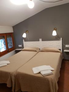 Cama o camas de una habitación en Apartaments Can Bundanci