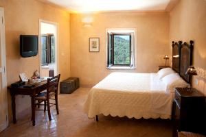 Llit o llits en una habitació de La Tavola Dei Cavalieri