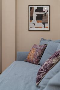 A bed or beds in a room at Absolute Athens v