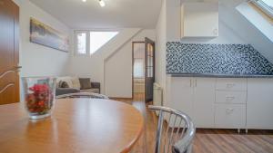 Kuchyň nebo kuchyňský kout v ubytování Coroni Residence + 24 fotografií