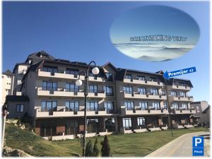 a rendering of a building with a street light at Ogi & Una Premijer 42 in Kopaonik