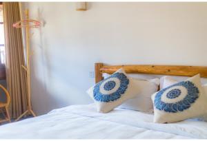 Postel nebo postele na pokoji v ubytování Log Cabin