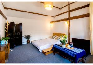 Postel nebo postele na pokoji v ubytování Log Cabin