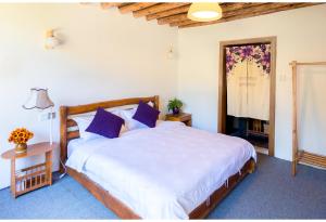 Postel nebo postele na pokoji v ubytování Log Cabin