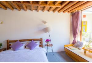 Postel nebo postele na pokoji v ubytování Log Cabin