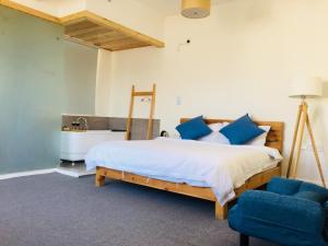Postel nebo postele na pokoji v ubytování Log Cabin