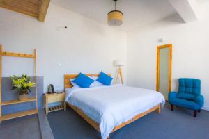 Postel nebo postele na pokoji v ubytování Log Cabin