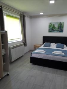 Katil atau katil-katil dalam bilik di Private Home Rifat