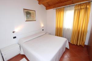 Posteľ alebo postele v izbe v ubytovaní Apartments Villa Buric