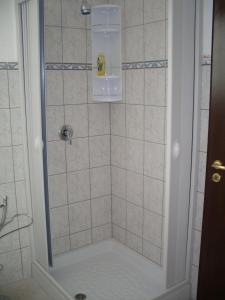Ett badrum på Affittacamere Peonia