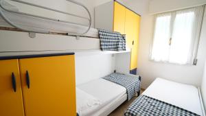 A bed or beds in a room at Appartamento Guido Reni