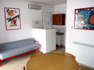 A kitchen or kitchenette at Appartamento Guido Reni